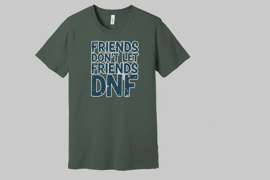 A green t-shirt with the text 'FRIENDS DON'T LET FRIENDS DNF' printed on the front, displayed against a brick wall background.