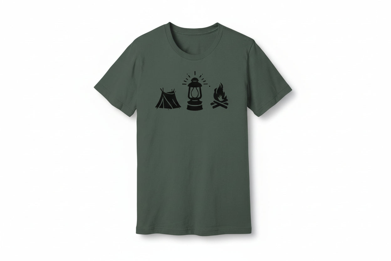 A green unisex T-shirt with a graphic design depicting a tent, lantern, and campfire on the front.