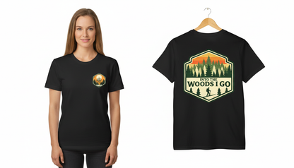 Black t-shirt with nature-themed design on a hanger, worn by a person.