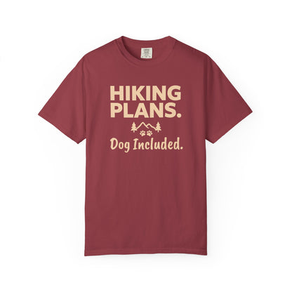 Red t-shirt with "Hiking Plans. Dog Included." text and mountain, tree, and paw print graphics.