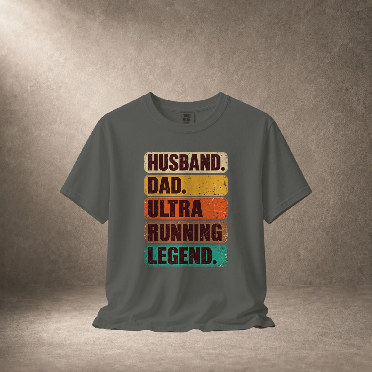 Dark grey t-shirt with "Husband. Dad. Ultra Running Legend." text.
