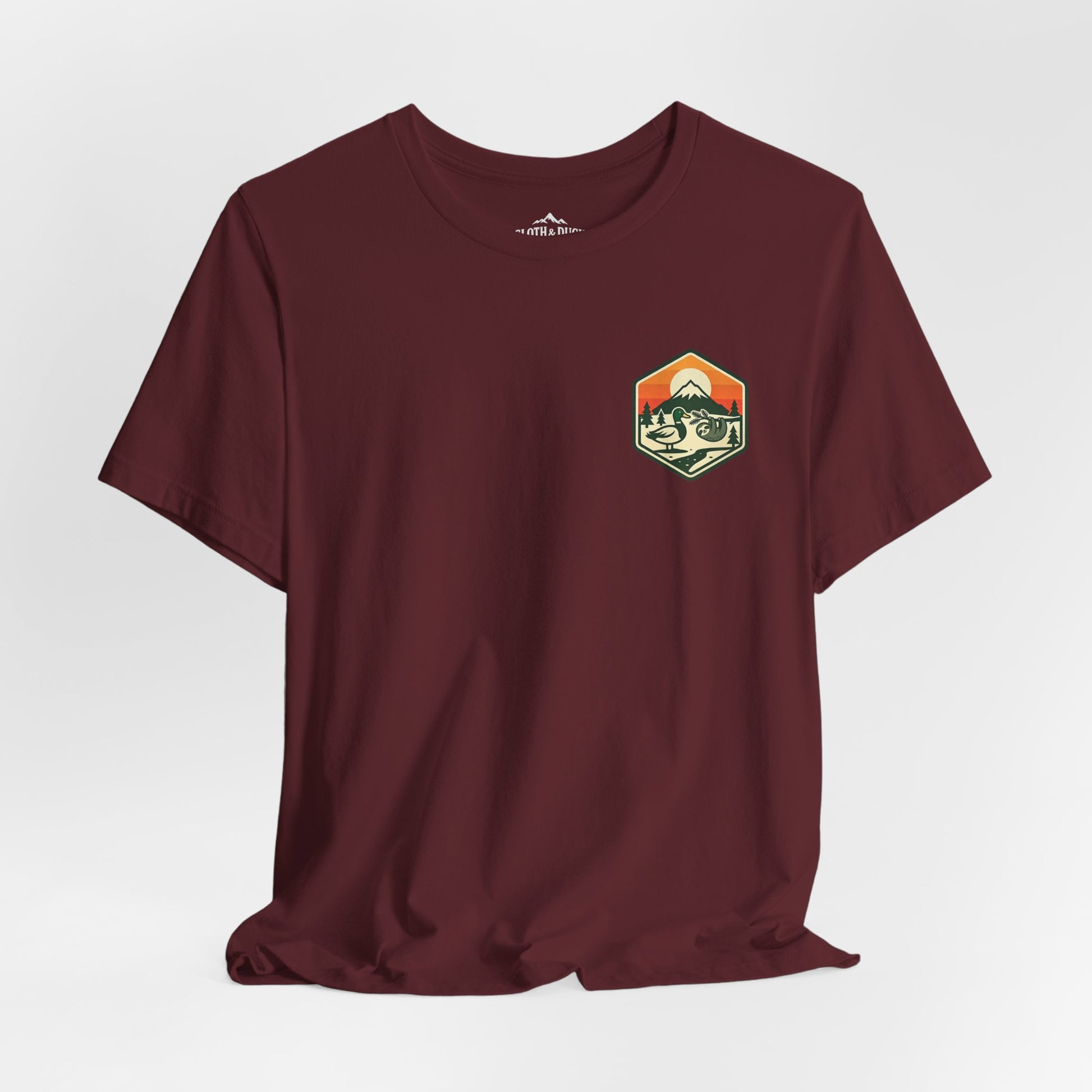 Maroon t-shirt with a colorful graphic on a white background