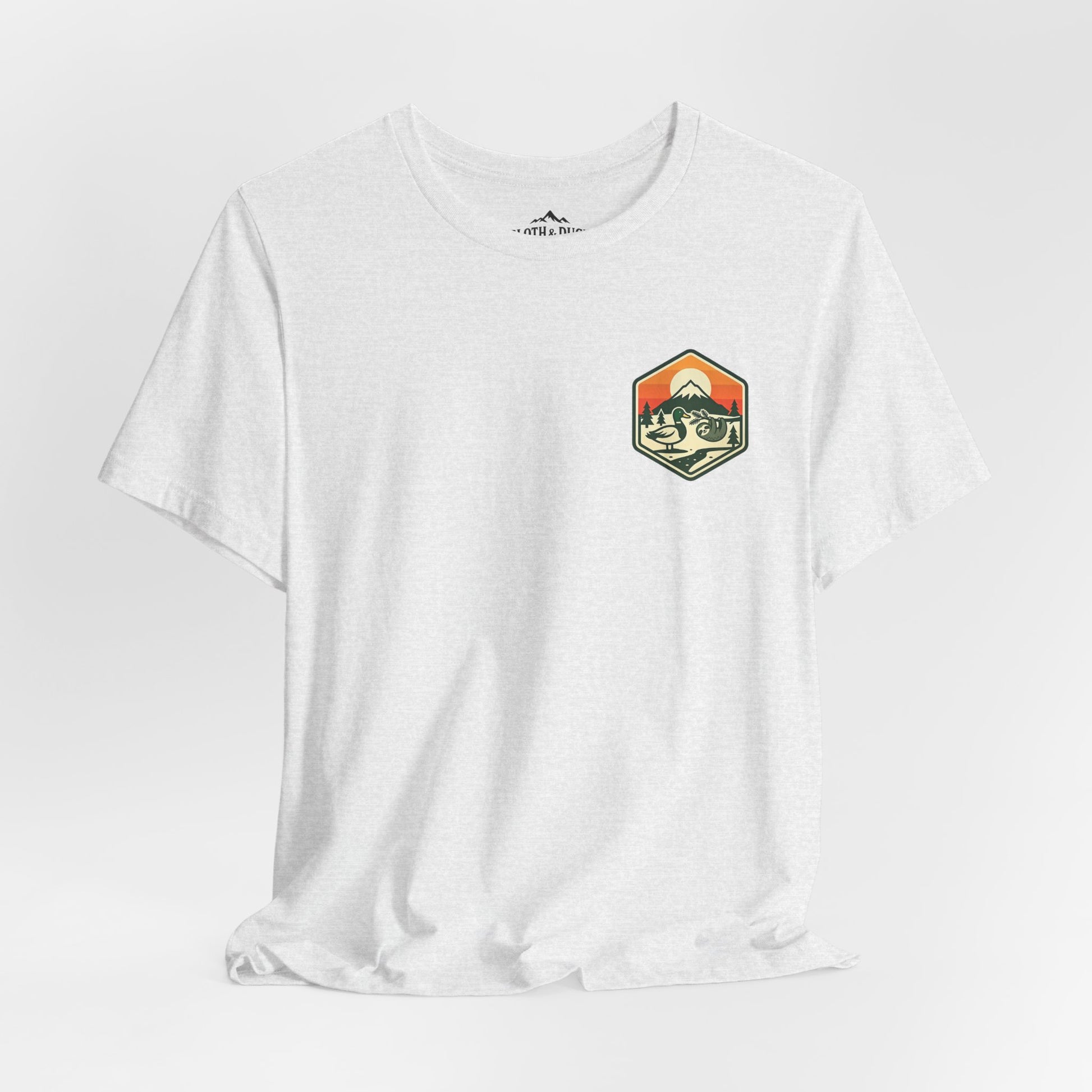 White t-shirt with a graphic design on a light gray background