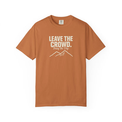 Orange t-shirt with "Leave the Crowd. Bring the Dog." graphic and paw prints.