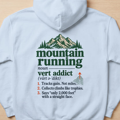 White hoodie with "mountain running vert addict" definition and mountain graphic.