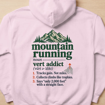 Pink hoodie with "Mountain Running: Vert Addict" definition and mountain graphic.