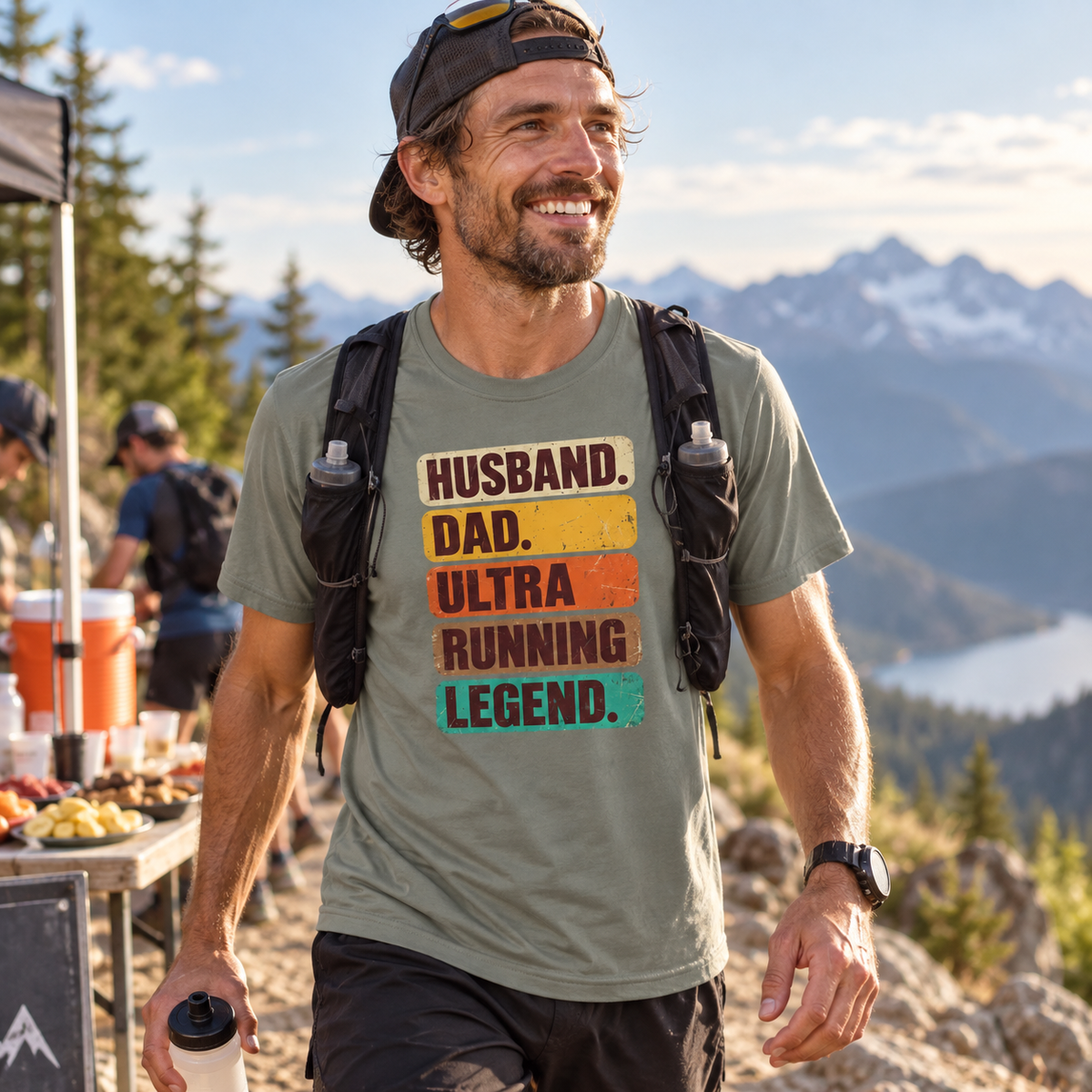 Man in olive shirt with text "HUSBAND. DAD. ULTRA RUNNING LEGEND."