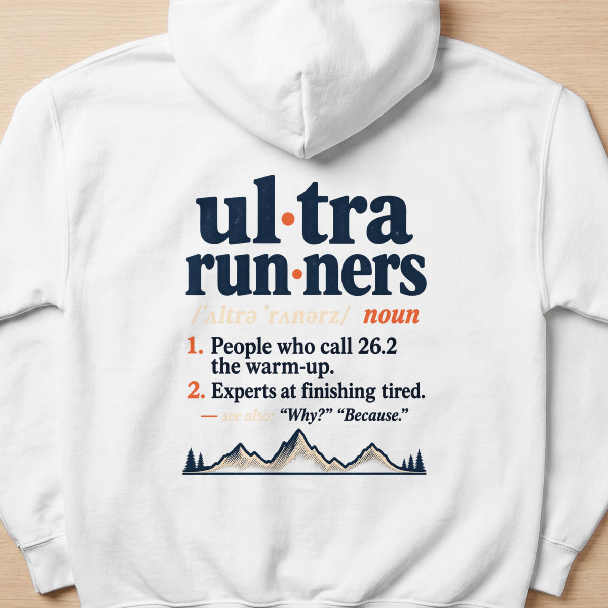 White hoodie with "Ultra Runners" definition and mountain graphic.