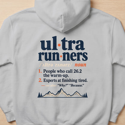 Gray hoodie with "Ultra runners" definition and mountain graphic.