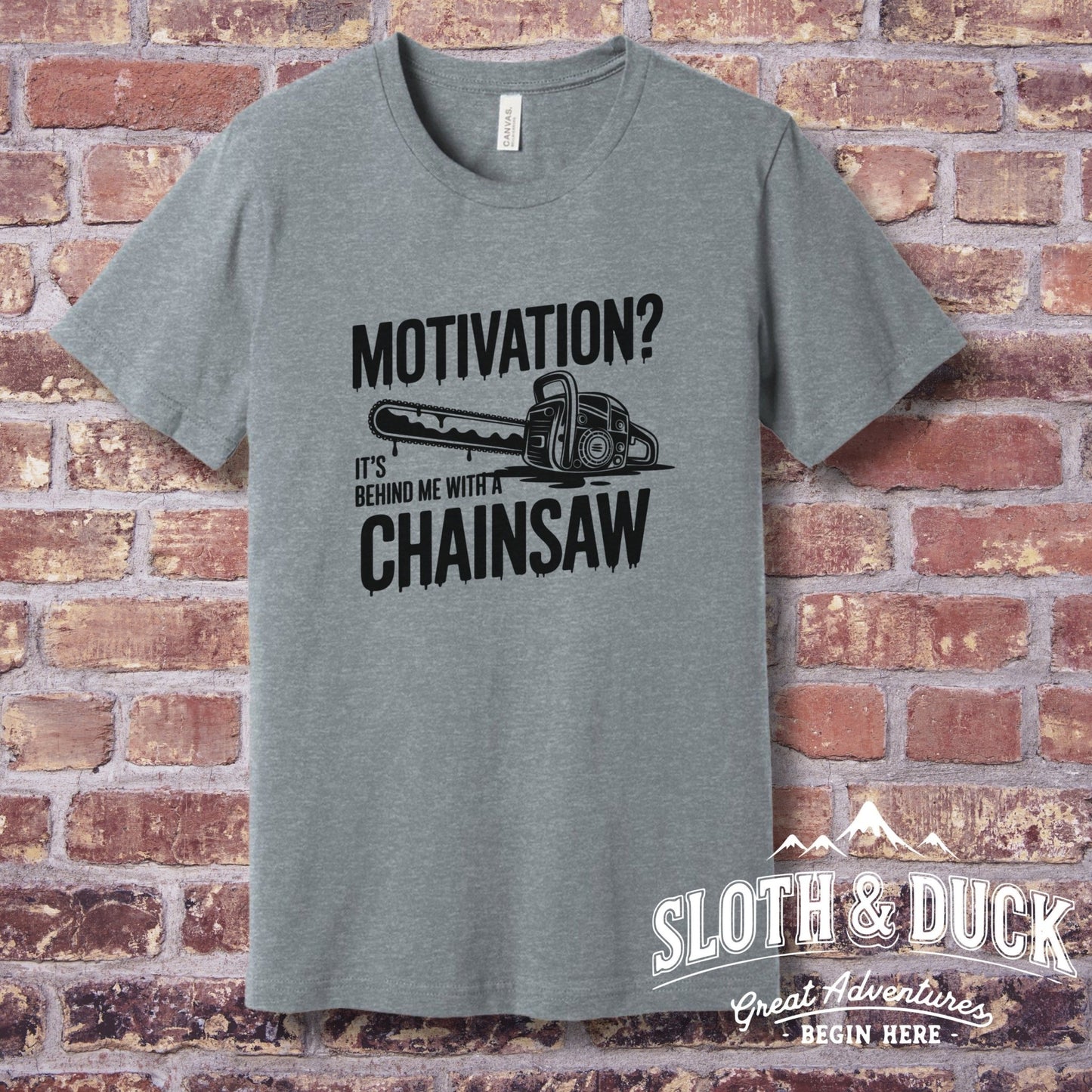 "Motivation? It's Behind Me With A Chainsaw" T-Shirt - T-Shirt - Sloth & Duck